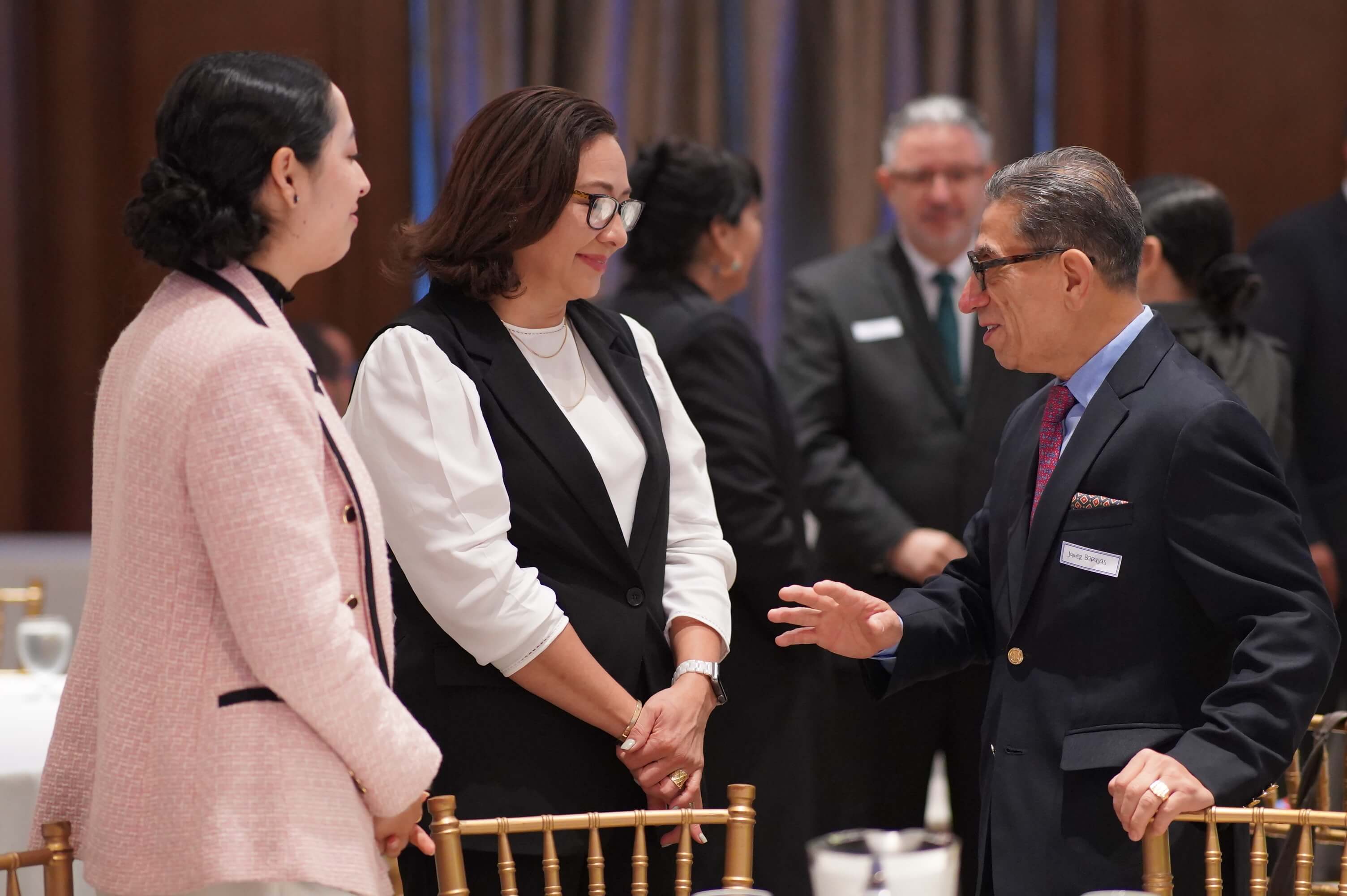 Professional event photography showing attendees networking at a corporate event in Vancouver