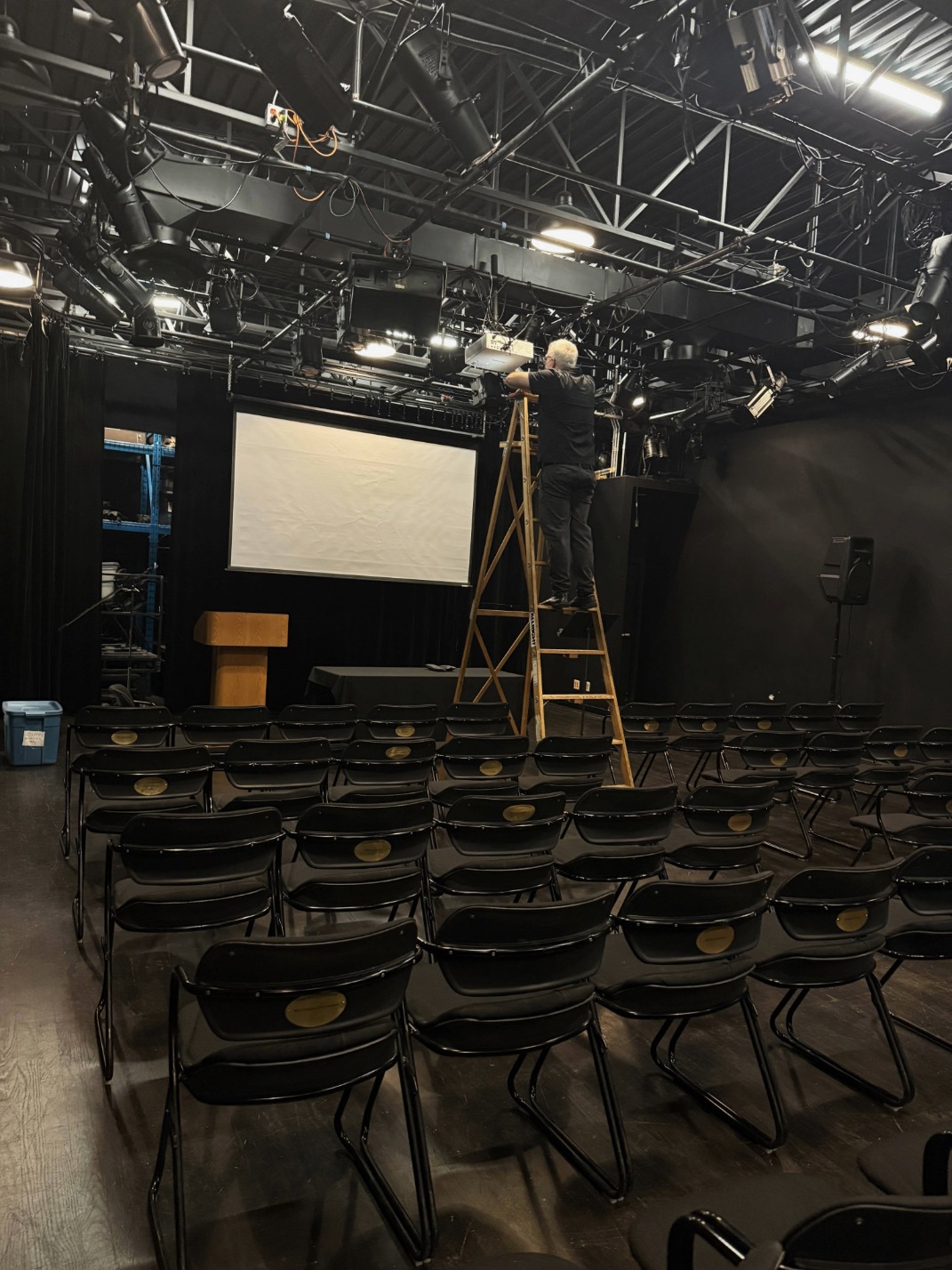 Event production tech table with audio mixer and live stream monitoring during a hybrid event in Vancouver